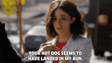 Woman saying, &quot;Your hot dog seems to have landed in my bun.&quot;