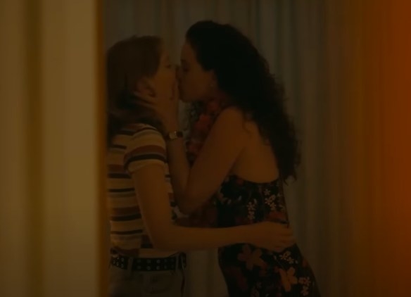 Adult KJ kisses her girlfriend
