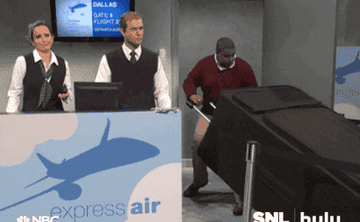 gif of someone trying to board a flight with a comically huge piece of luggage