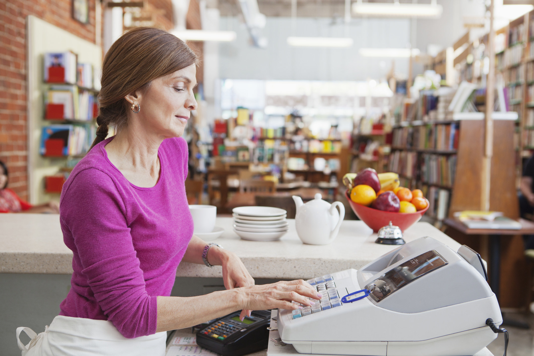 Woman working at a cash register