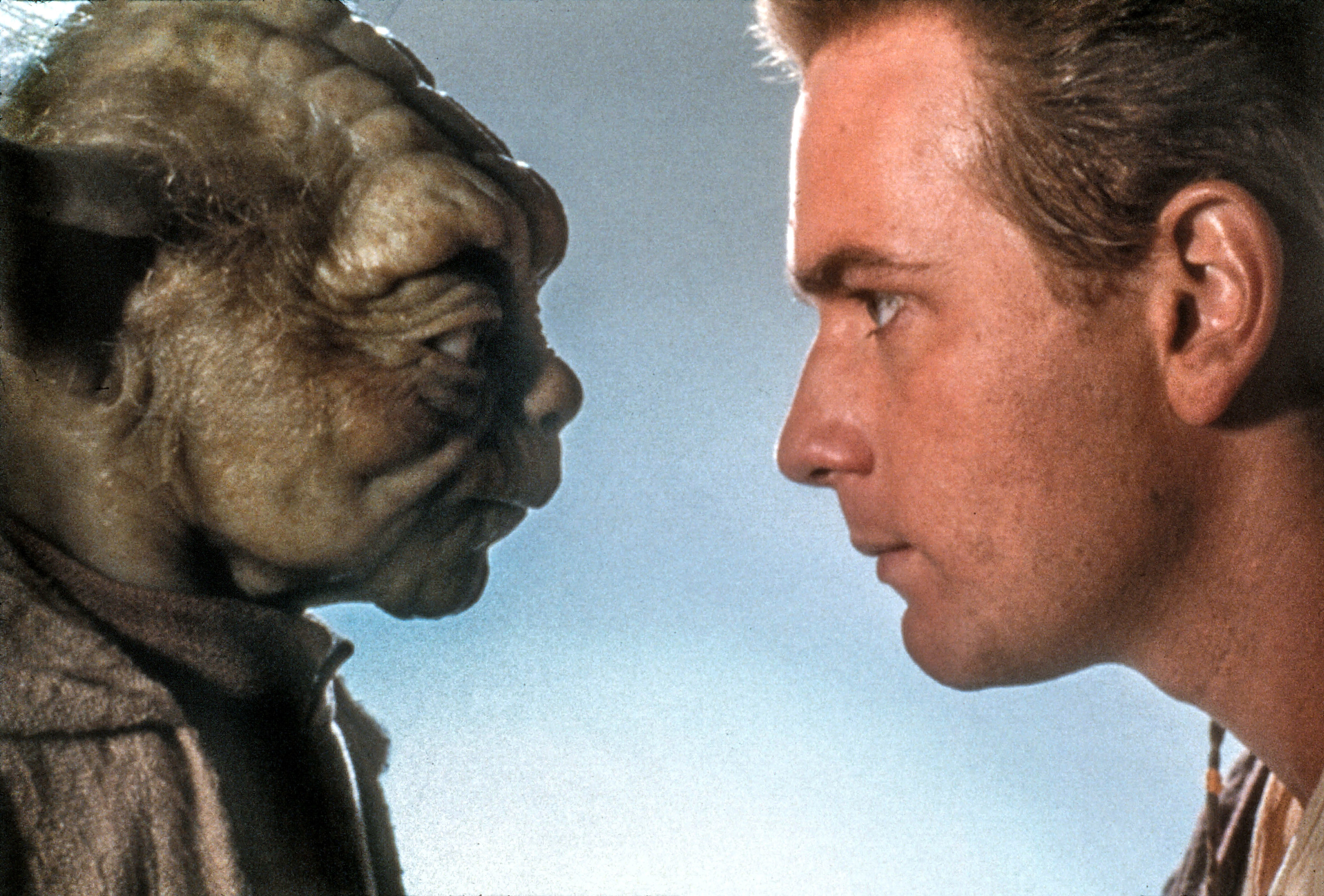 Yoda looks at Ewan McGregor