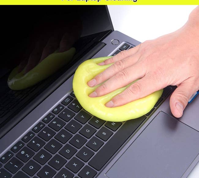 cleaning goo pressed onto laptop keyboard