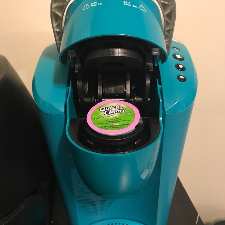 reviewer image of cleaning K-cup placed inside Keurig
