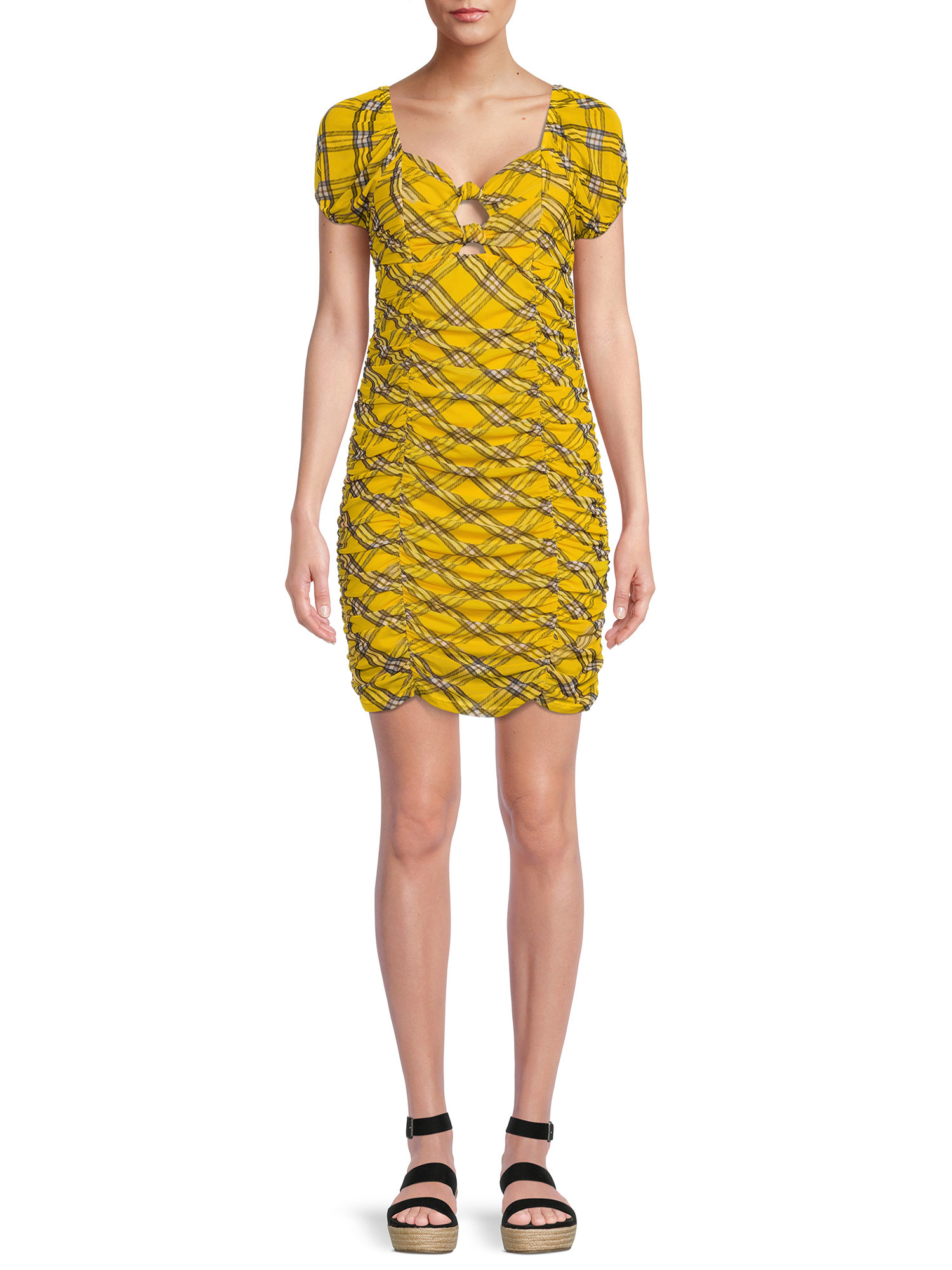 Model wearing yellow plaid ruched mini dress