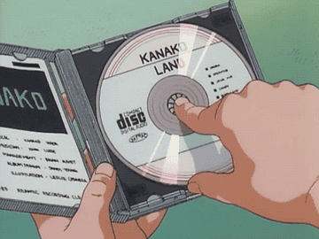 A cd reflects an anime face