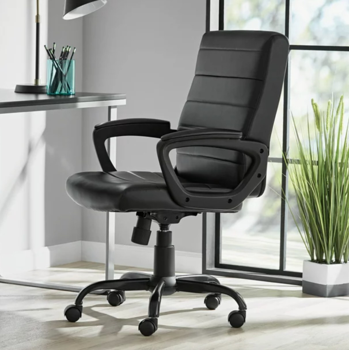 the black office chair with high cushioned back