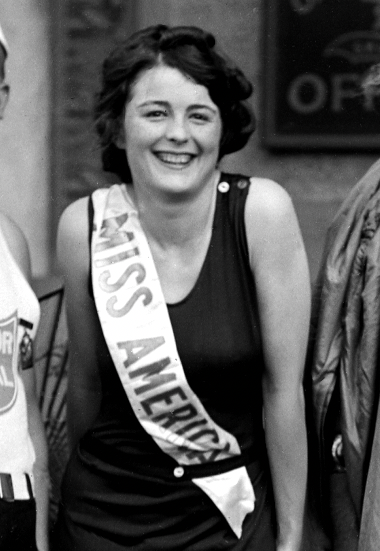 black and white photo of Campbell smiling