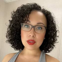 reviewer wearing shade perfect red, a classic red lipstick