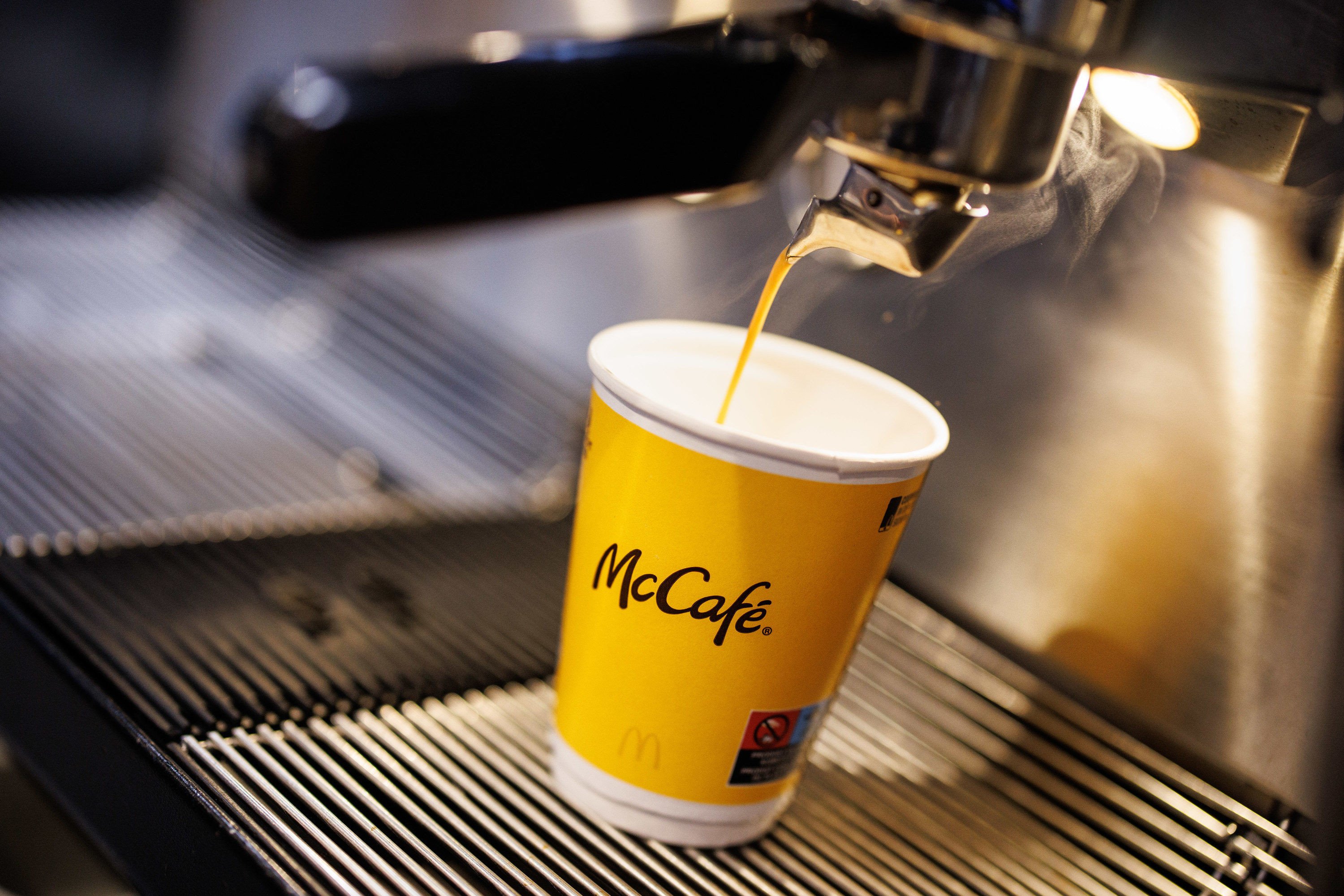 a hot mcdonald&#x27;s coffee being poured