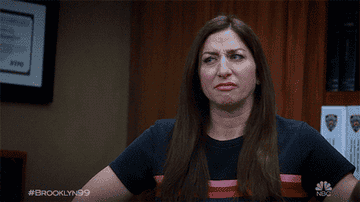 gina from brooklyn 99 making a disgusted face