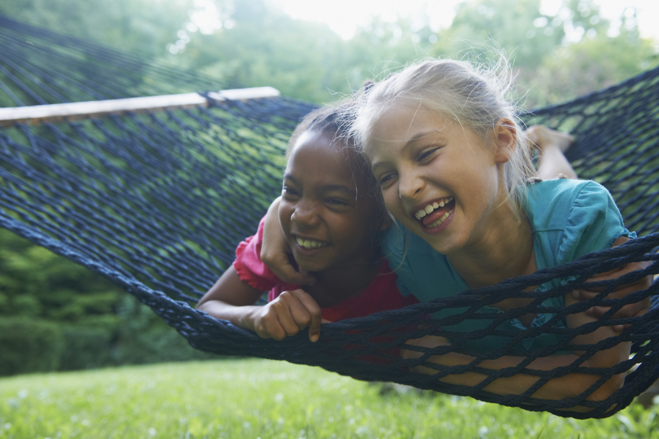 kids hanging out on a hammock