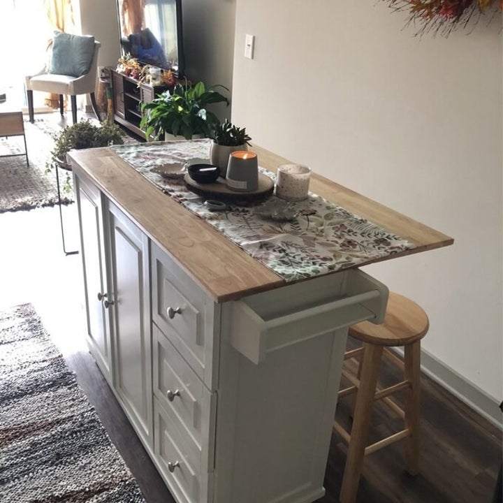 a reviewer photo of the kitchen cart in white