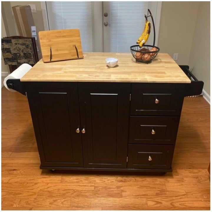 a reviewer photo of the kitchen cart in black