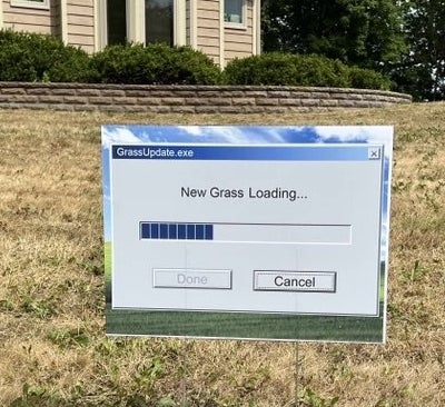 &quot;New Grass Loading&quot; sign