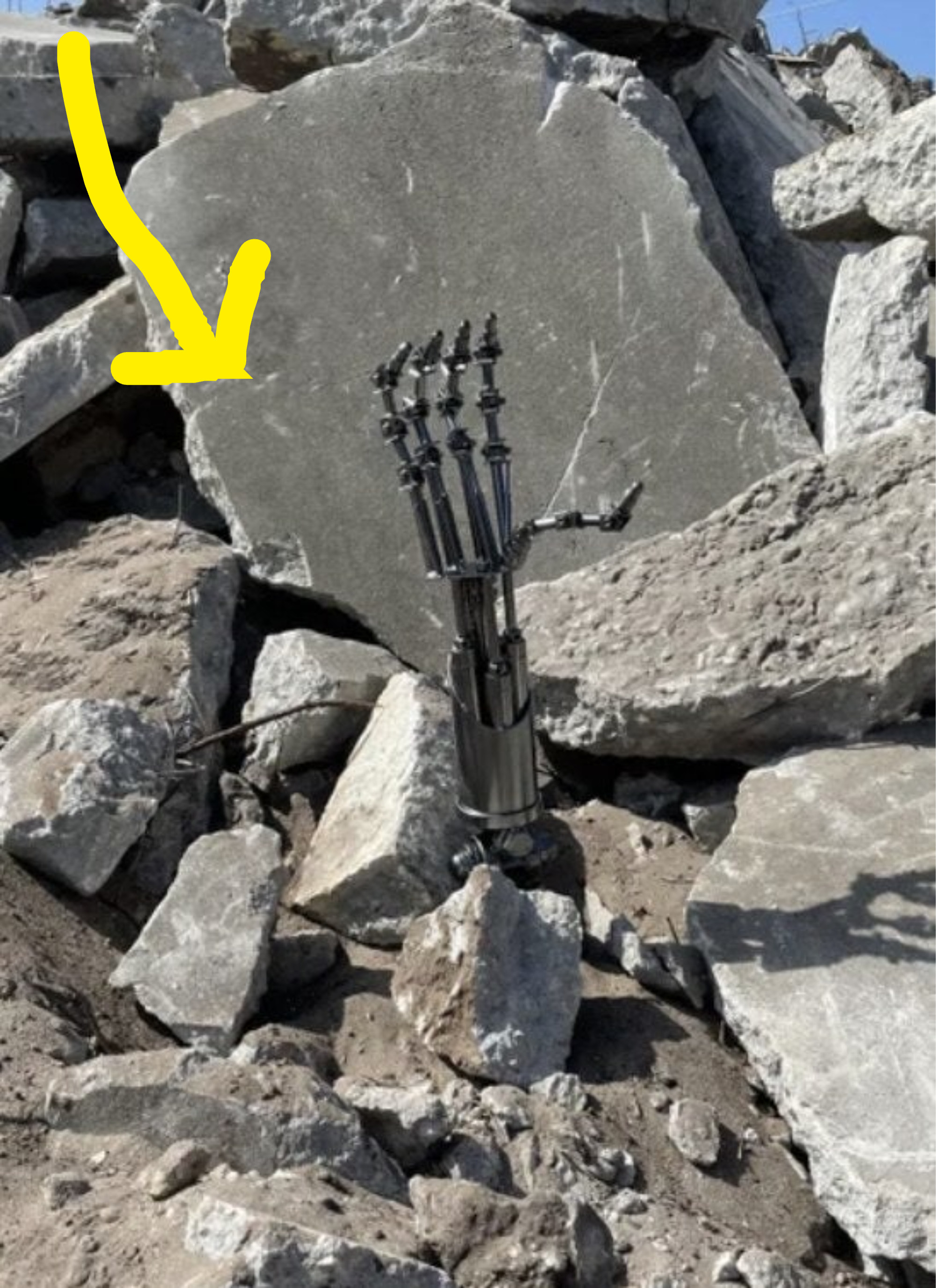 A Terminator arm in some rubble