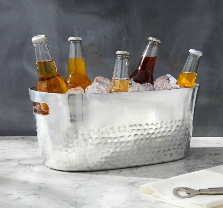 Silver tub filled with ice and bottles