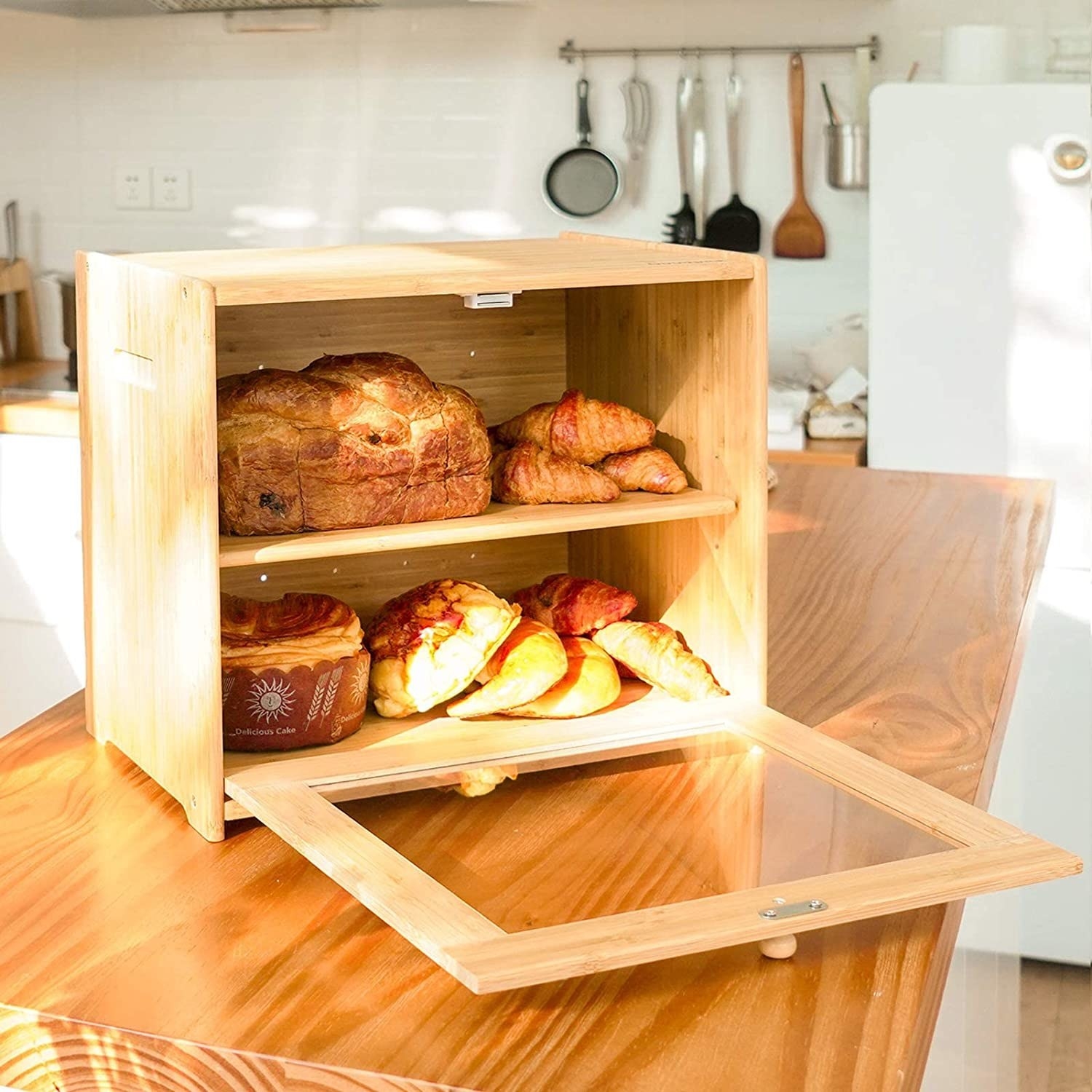 The bread box with several loaves inside