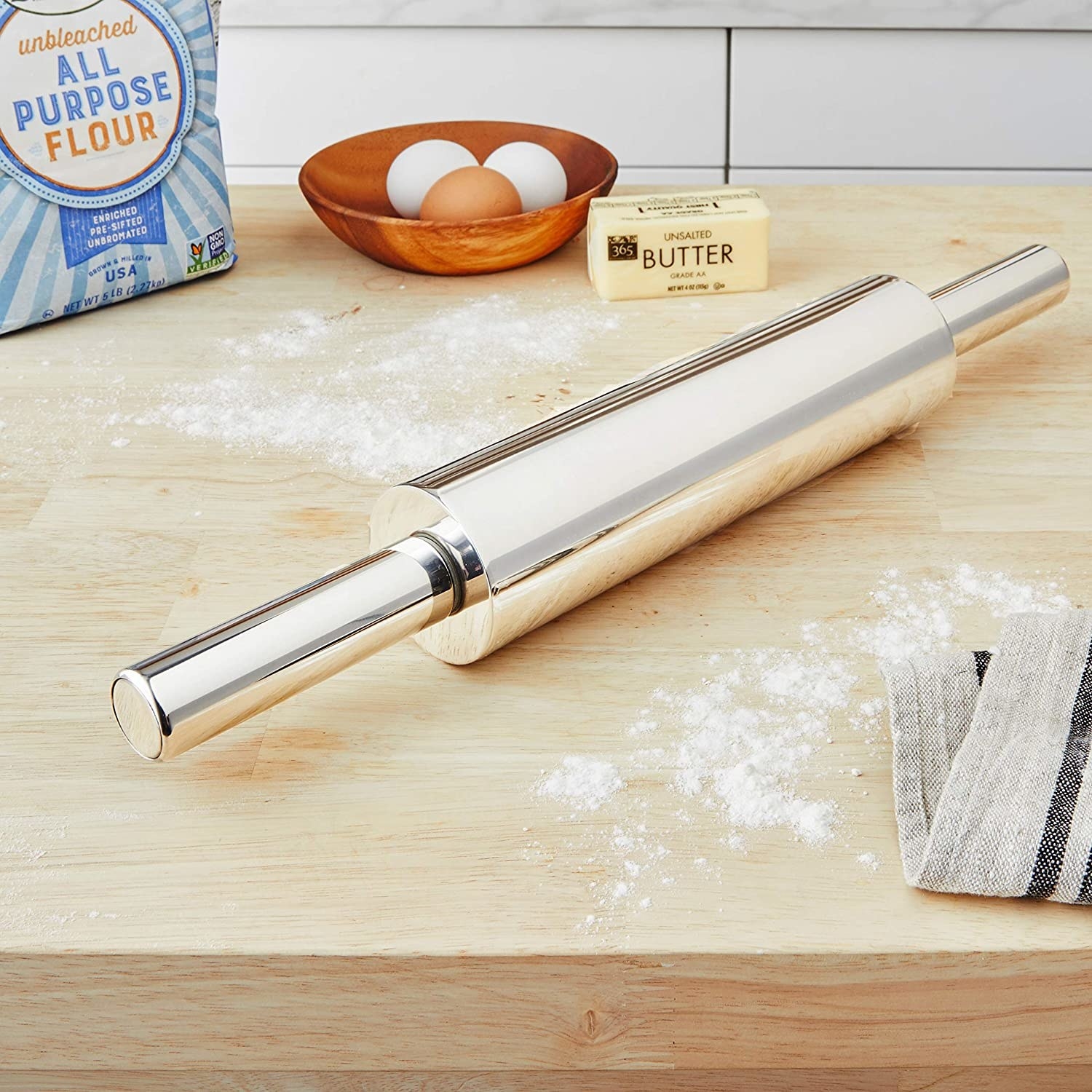 The rolling pin on a floured surface