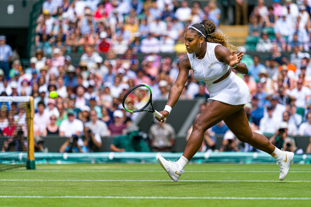 Serena runs toward a tennis ball as she prepares to hit a shot