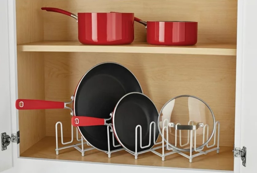 wire pan organizer in cupboard