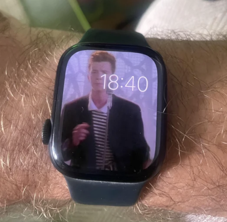 a watch with Rick Astley singing on it