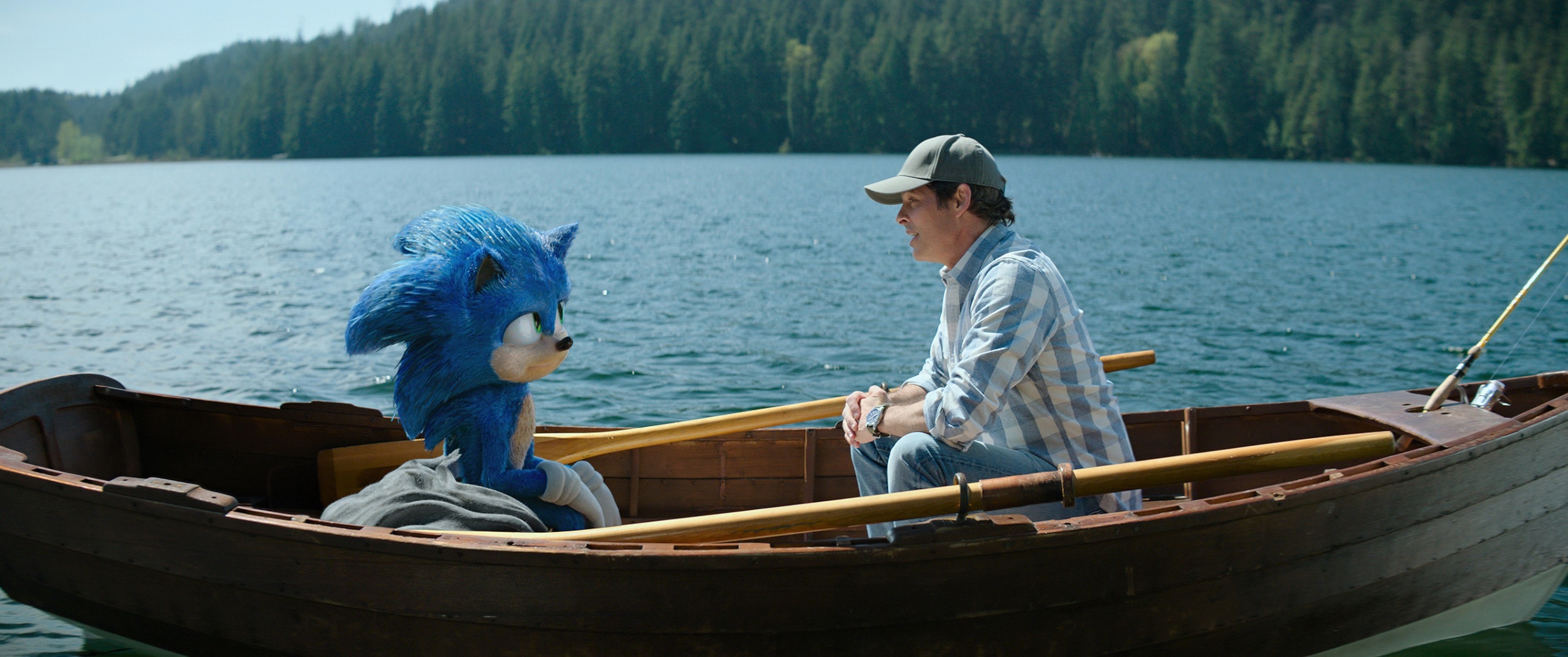 Sonic sits in a boat with James Marsden