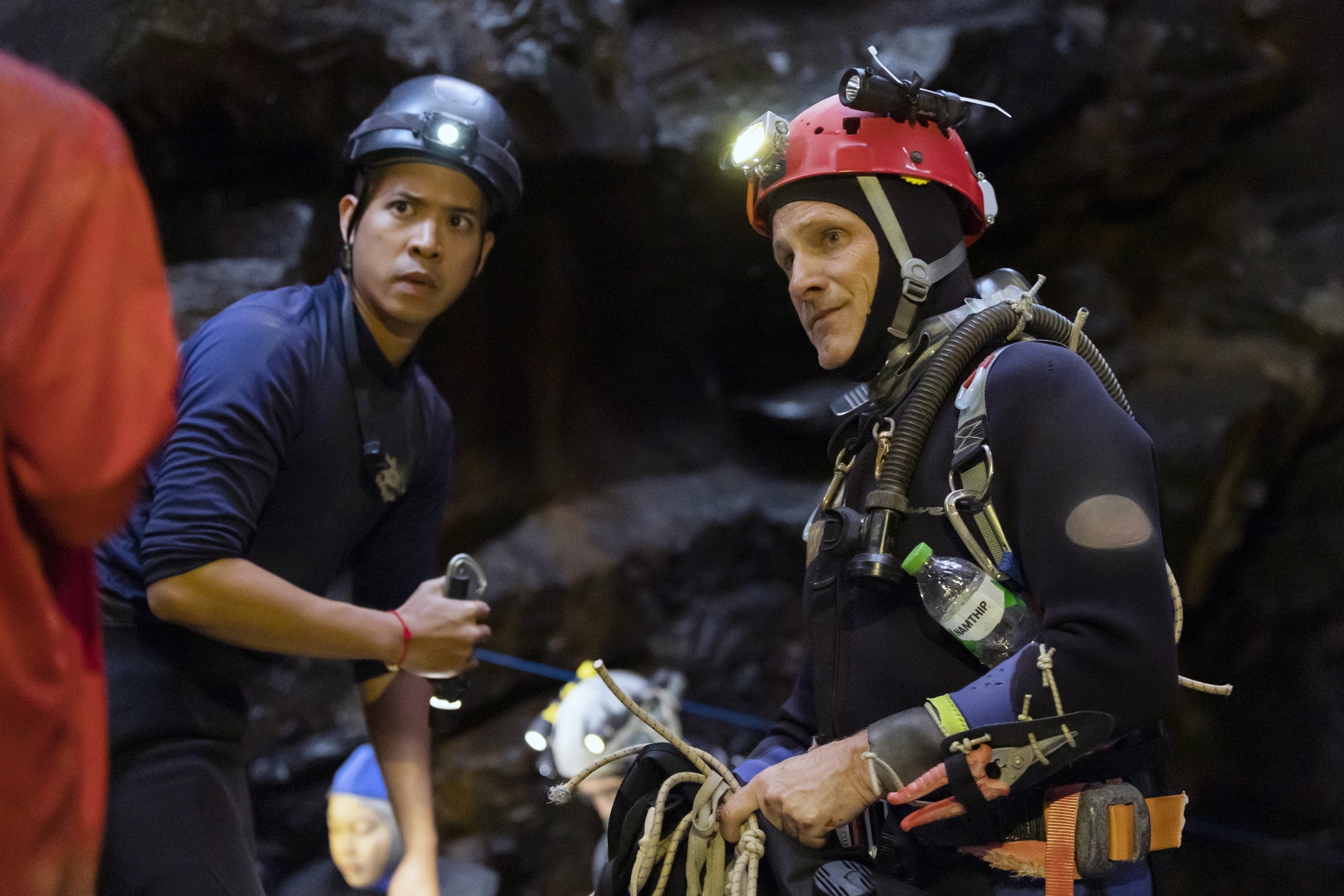 Thira Chutikul and Viggo Mortensen prepare to go cave diving
