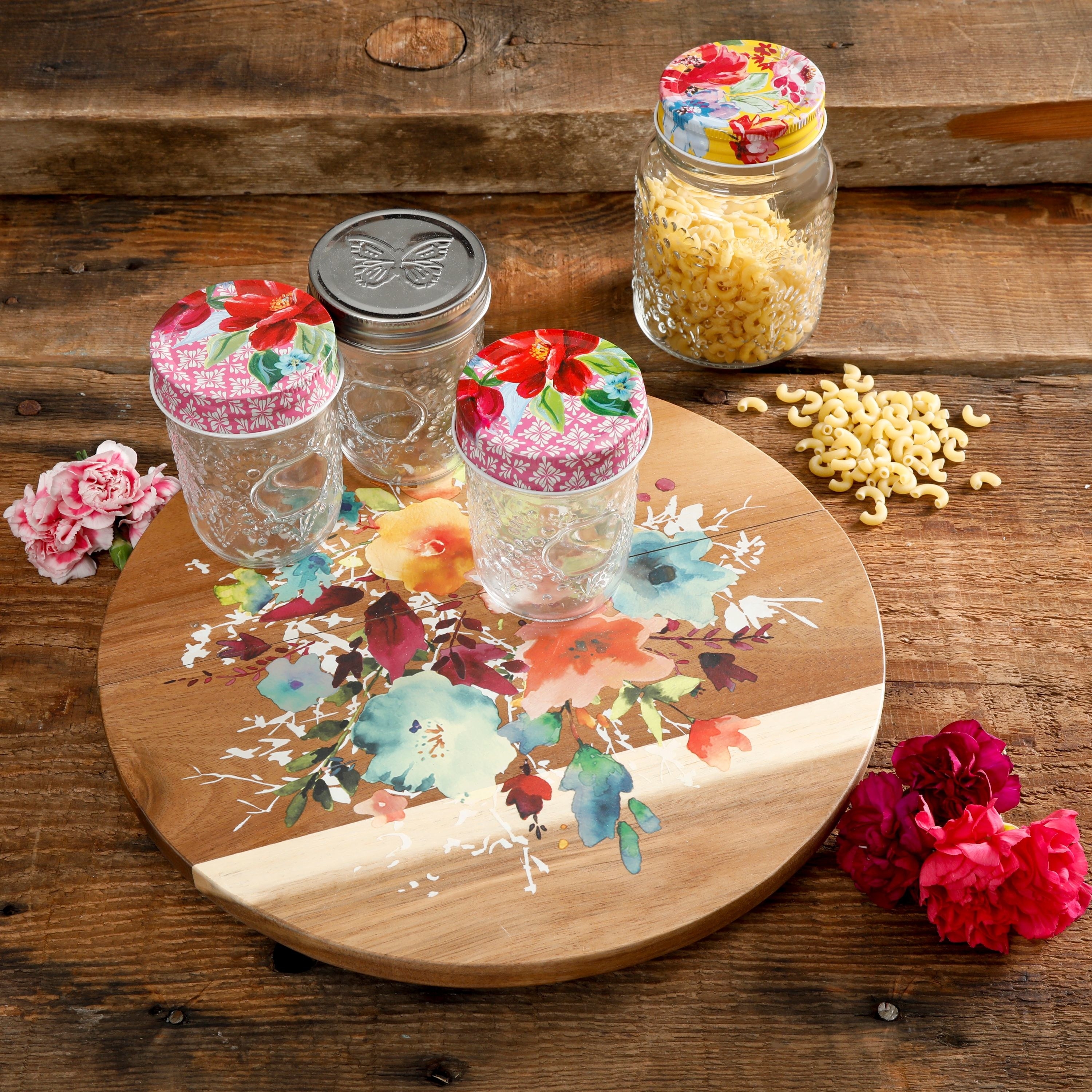 the floral turntable with mason jars on top
