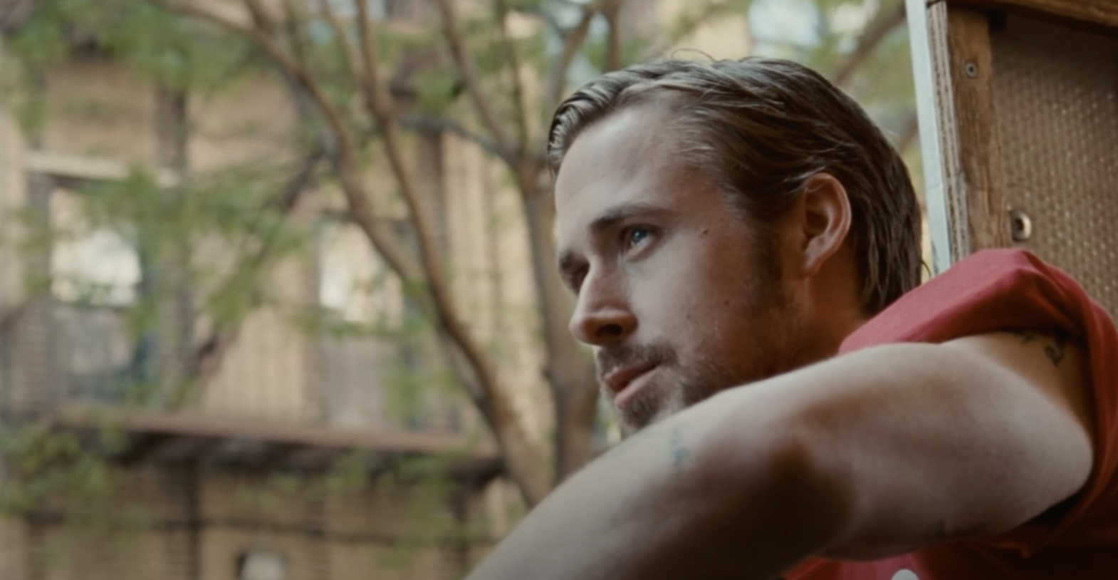 Ryan Gosling looks off into the distance
