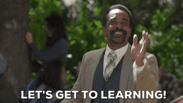 GIF of a man smiling and saying &quot;Let&#x27;s get to learning&quot;