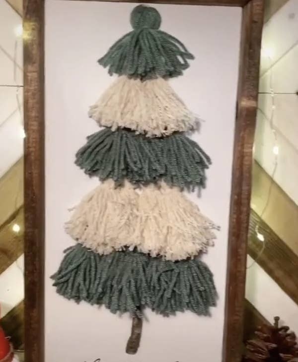 A tree made from yarn tassels