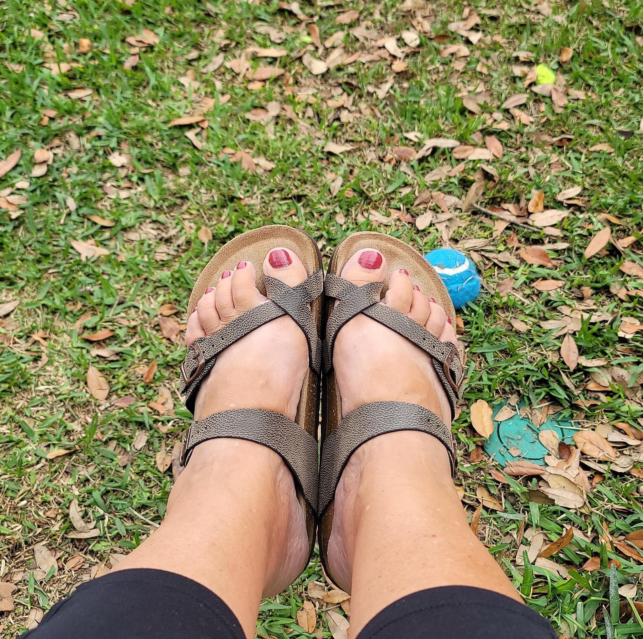 reviewer in the grey pebbled sandals