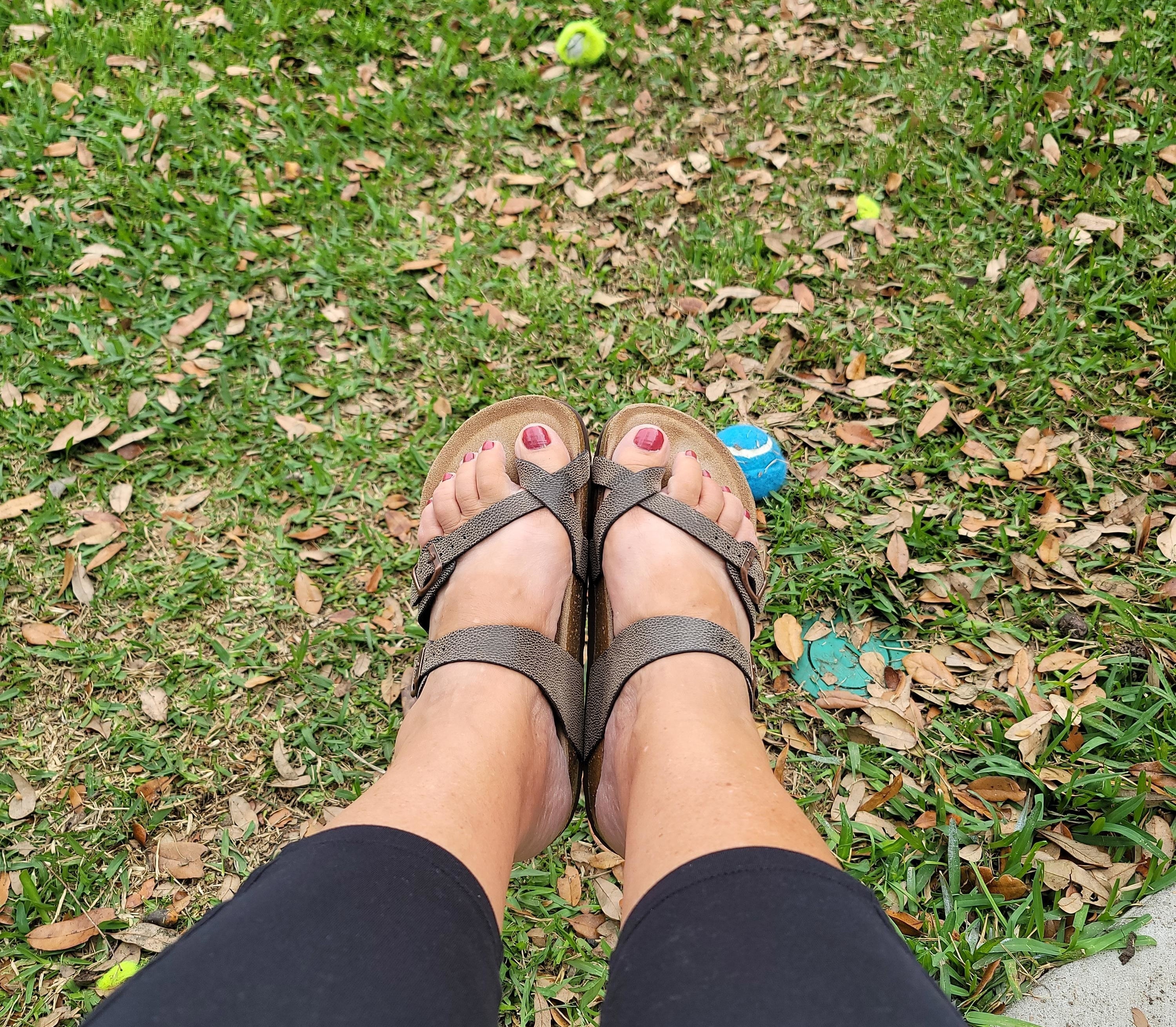 reviewer in the grey pebbled sandals