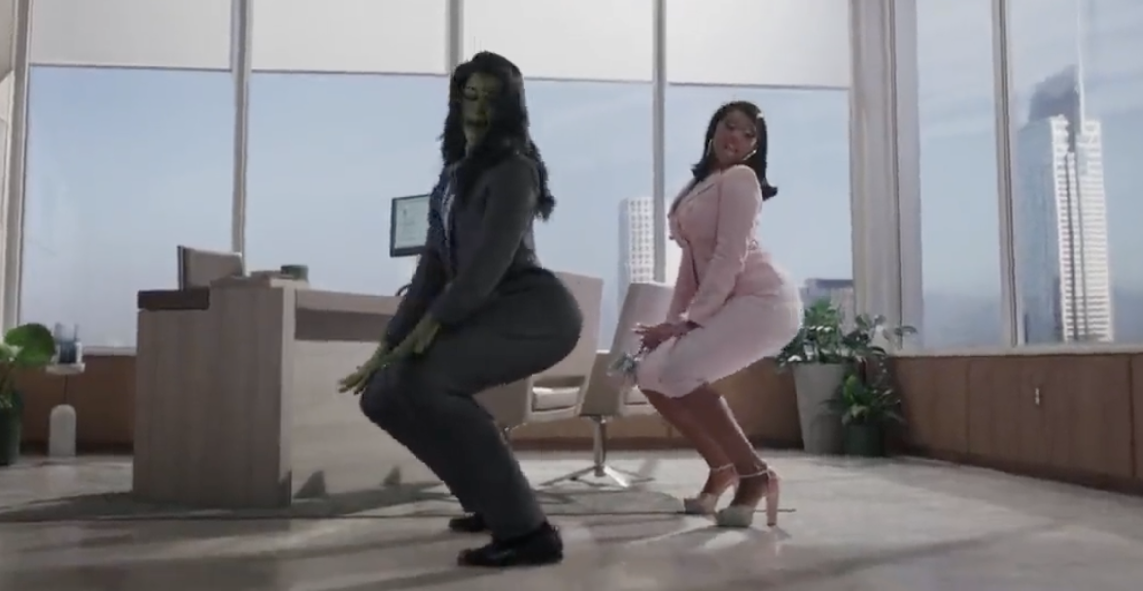 She-Hulk and Megan twerking in an office