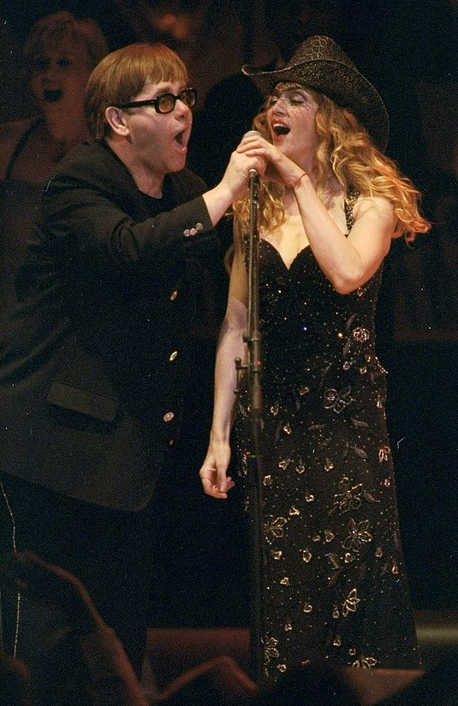 Elton and Madonna onstage singing