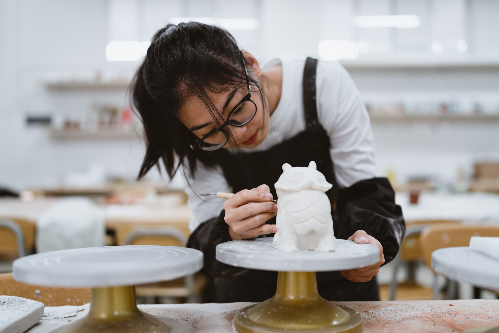 A person in a ceramic studio