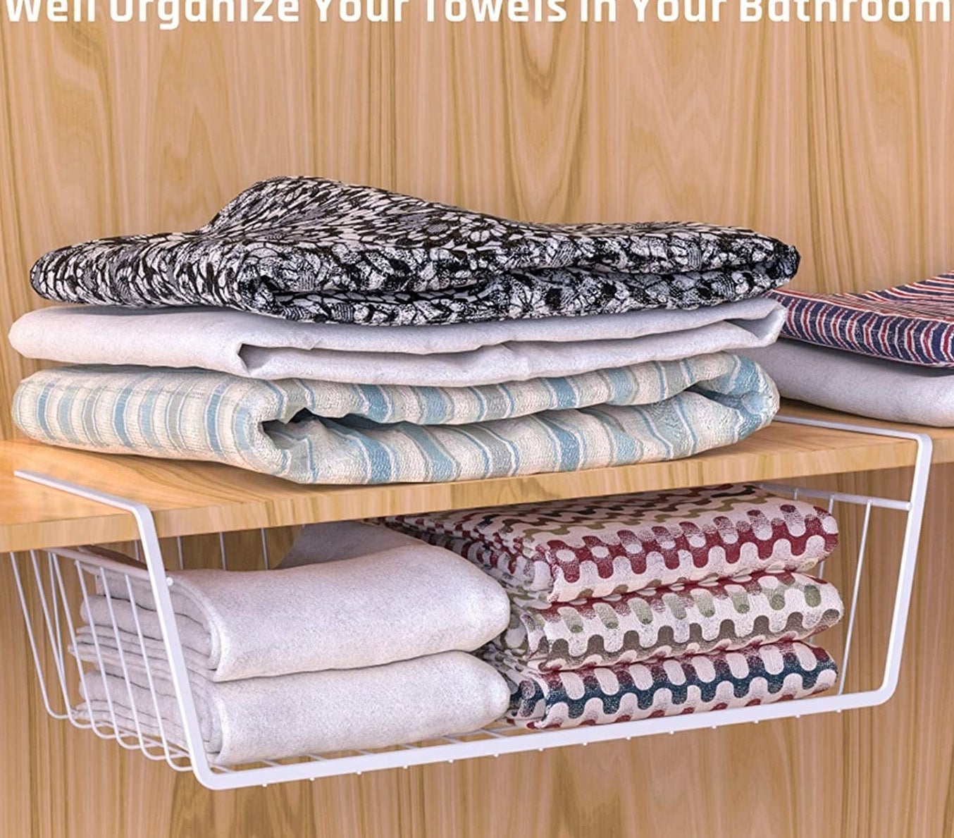 The basket on a shelf with towels in them
