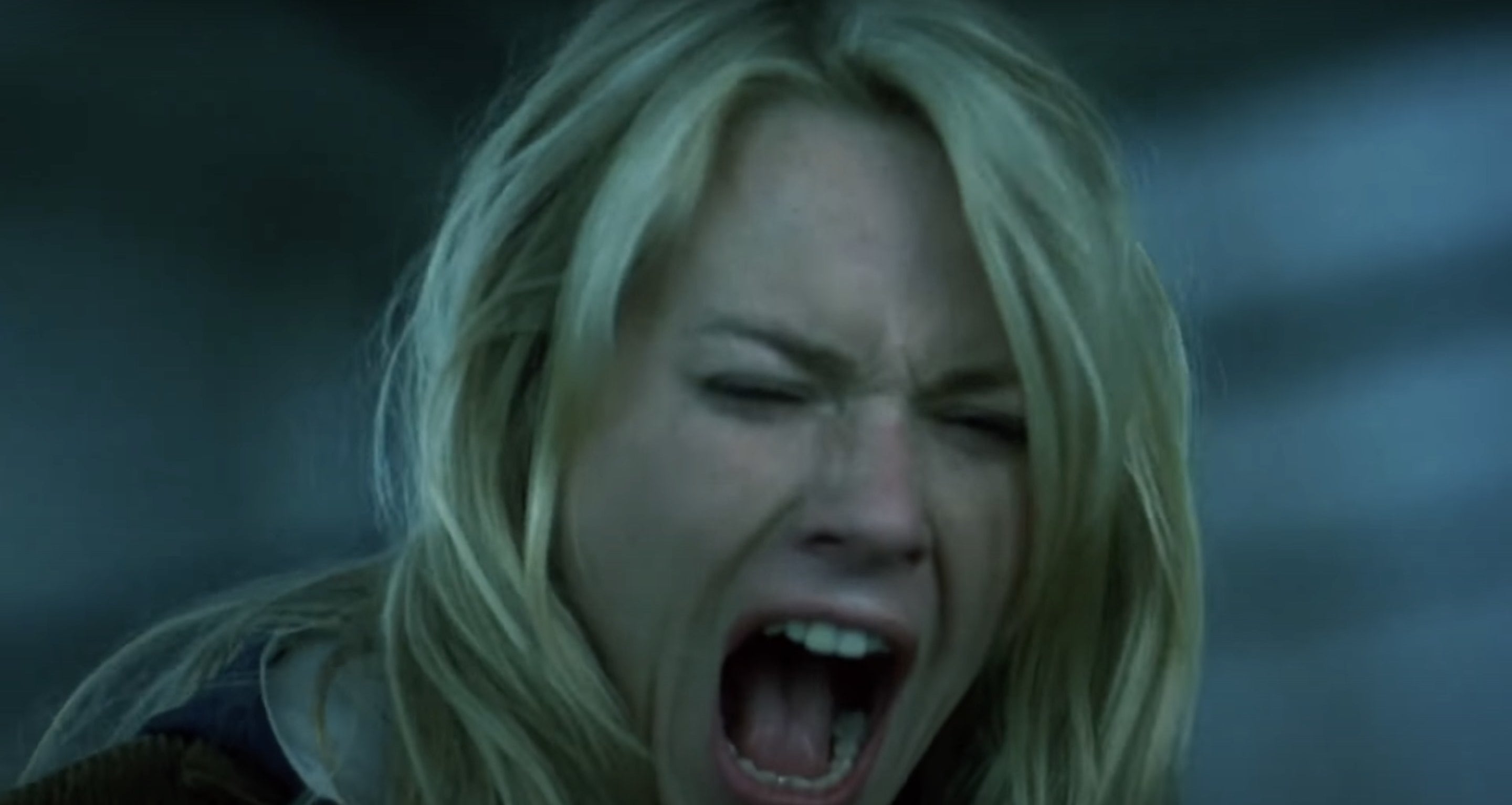 Close-up of woman screaming