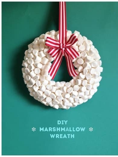 A marshmallow wreath with a candy cane ribbon