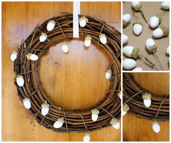 A grapevine wreath decorated with bejeweled acorns