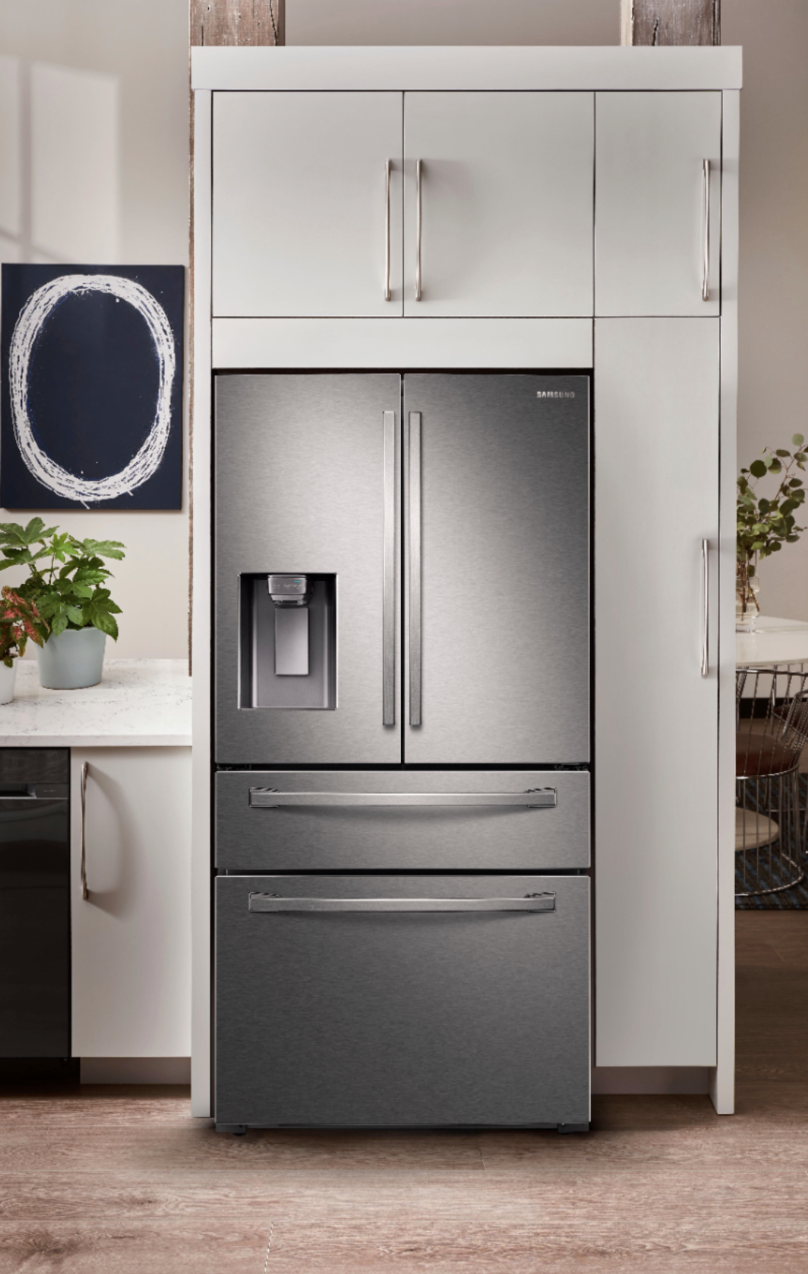 silver Samsung fridge with two double doors and two additional compartments