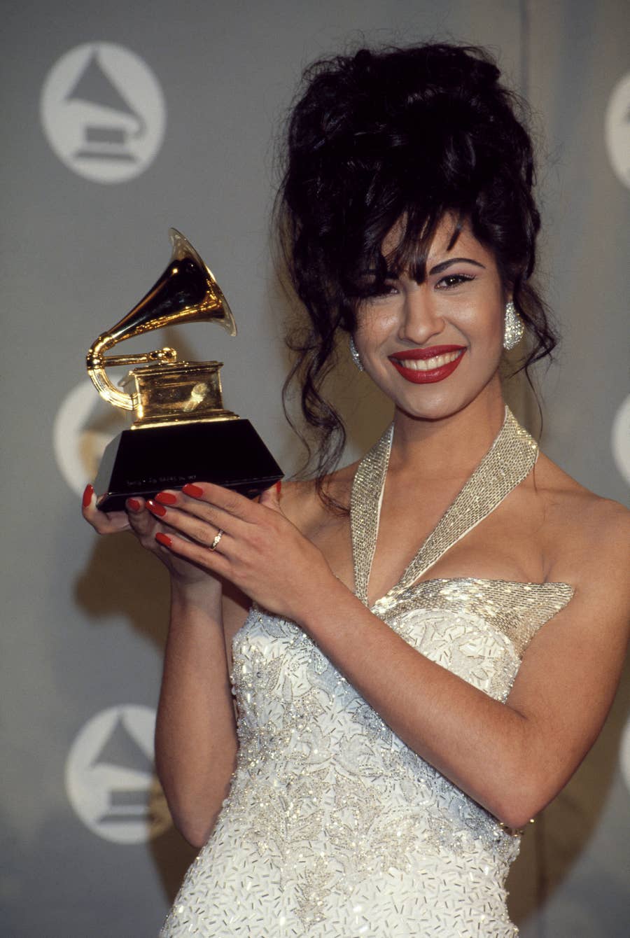 selena quintanilla gold dress The 45 Greatest Latine Red Carpet Looks Of All Time PLUS