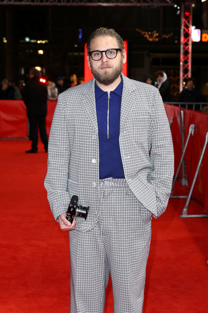 Jonah in a checkered suit on the red carpet