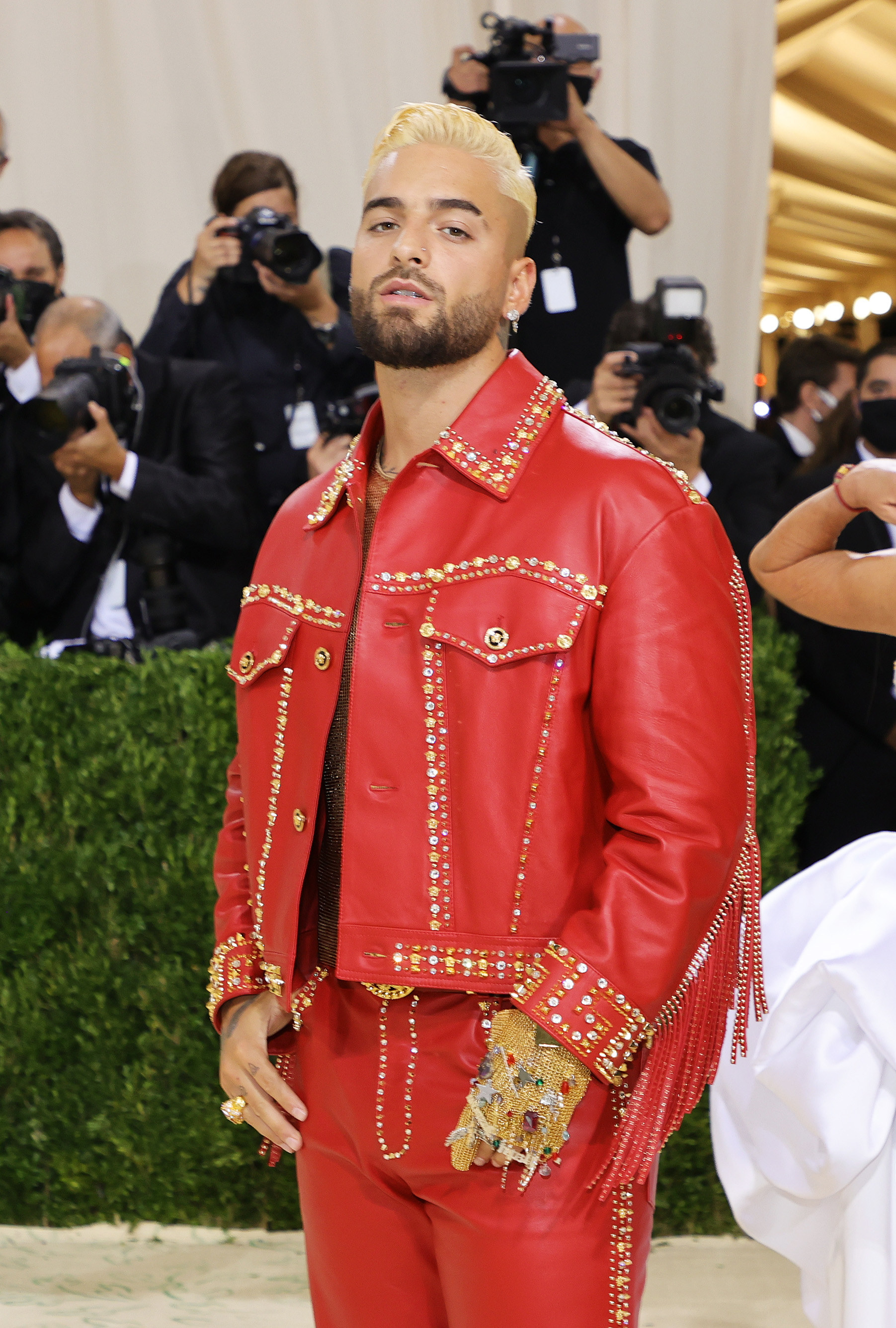 Maluma is seen at The 2021 Met Gala in a red leather Versace outfit