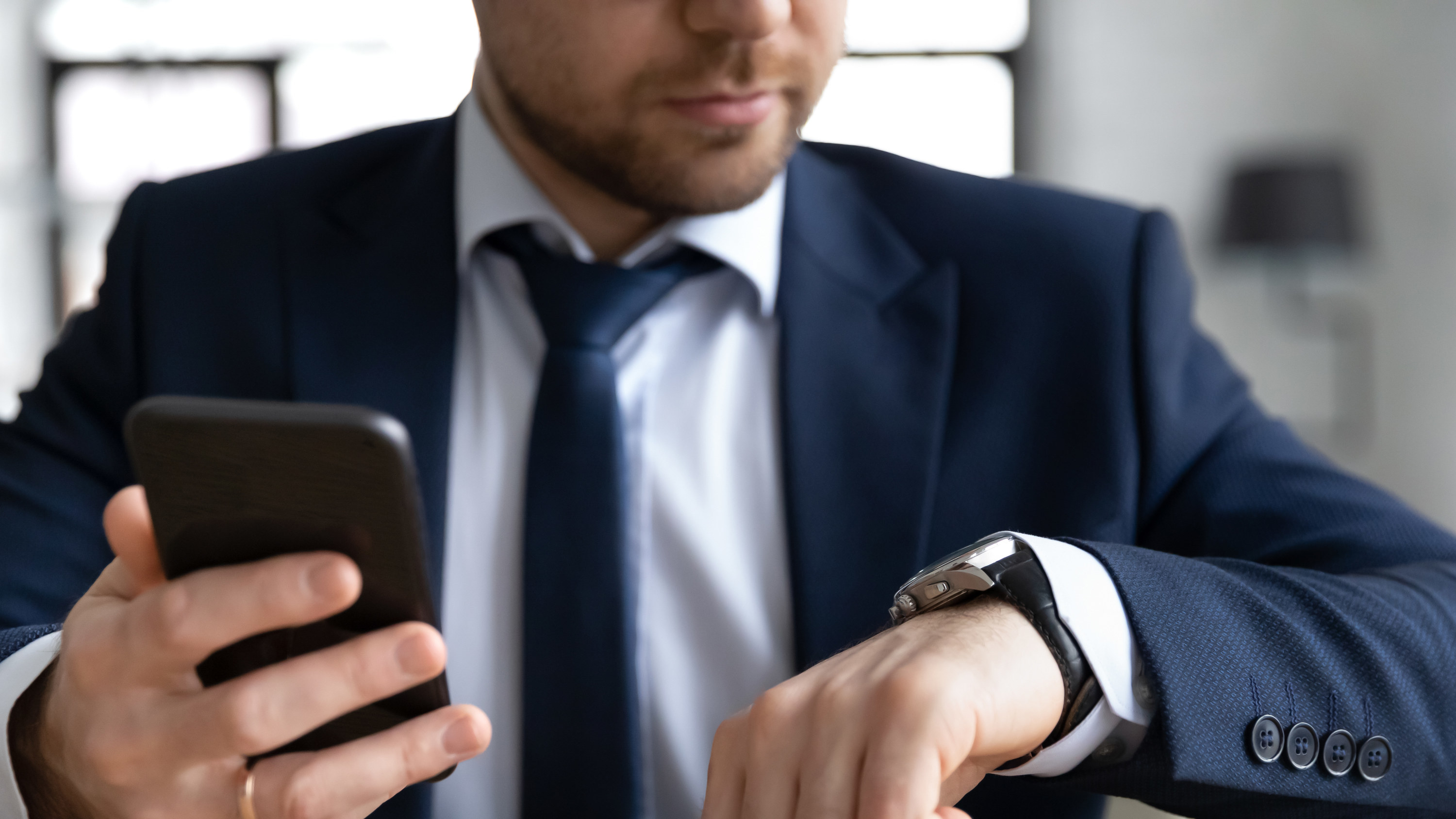 manager looking at his watch