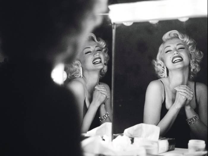 ana as marilyn smiling in a mirror