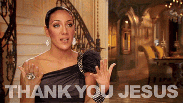 Melissa Gorga doing the sign of the cross and saying &quot;thank you jesus&quot;