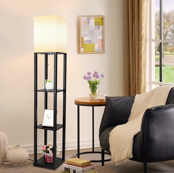 Shelf lamp with decorative items next to an armchair