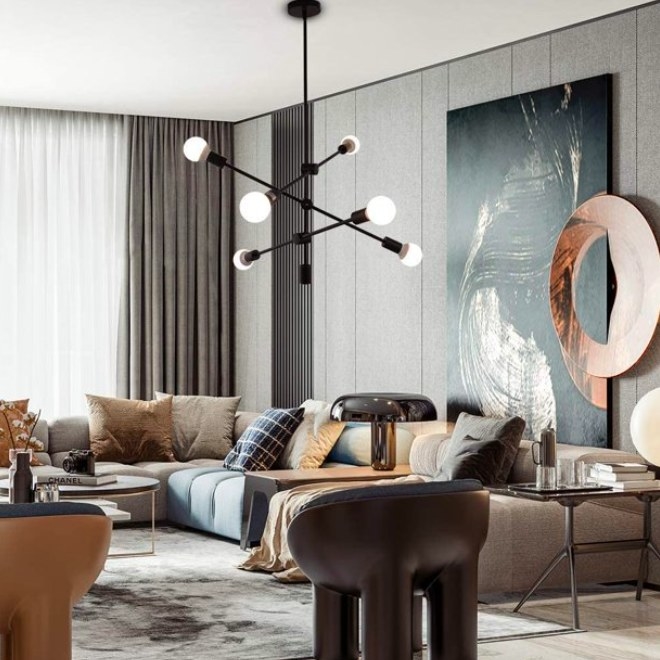 Black sputnik chandelier shown in a modern living room.