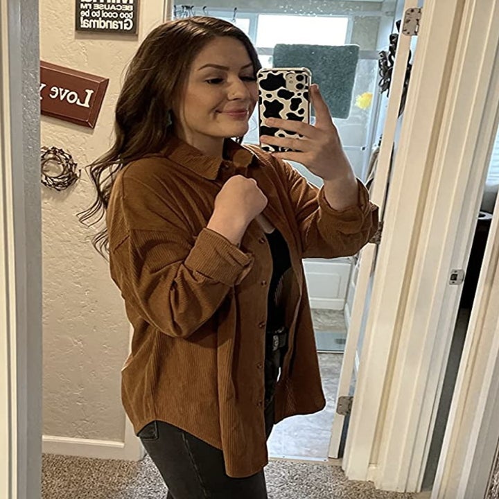 reviewer wearing the button down